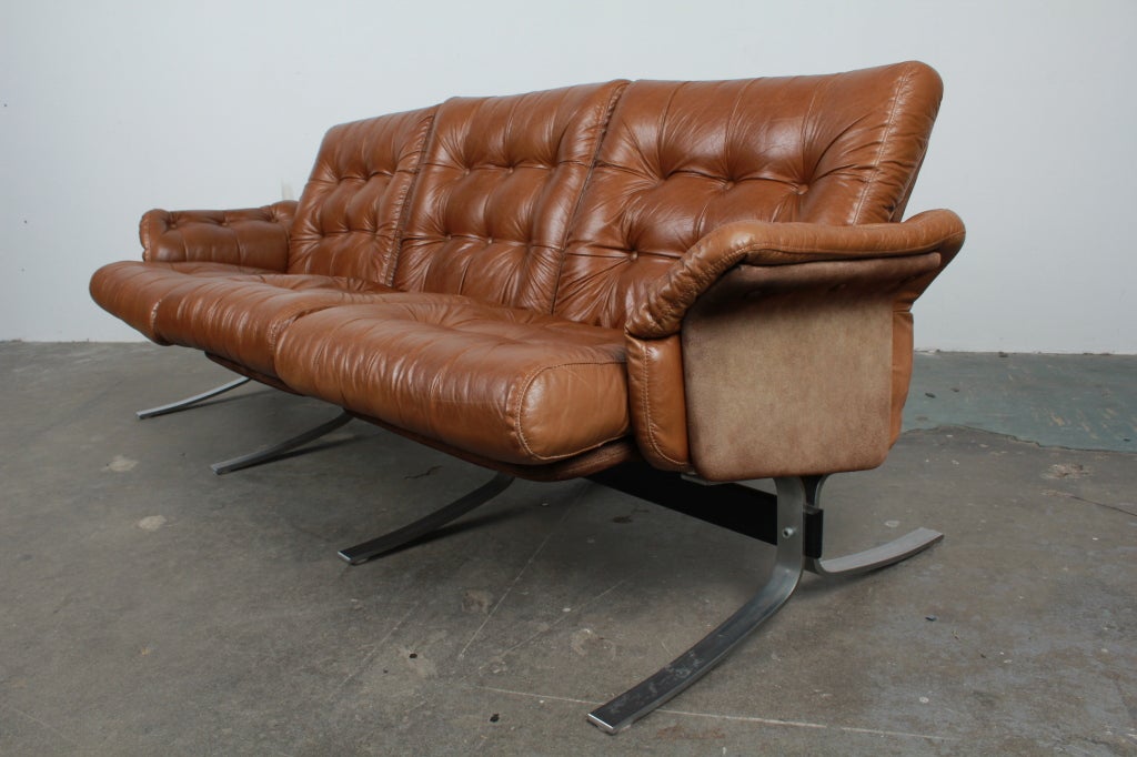 leather sofa with metal frame