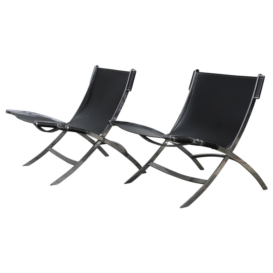 Pair of Mid-Century Chrome and Leather Lounge Chairs, attr. Paul Tuttle