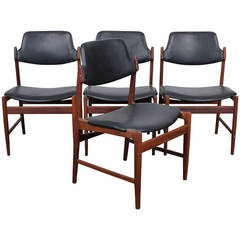 4 Danish black leather and teak dining chairs by Arne Vodder for Sibast.
