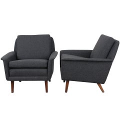 Pair of low back Danish mid century modern lounge chairs.