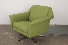Mid century modern low back swivel lounge chair.