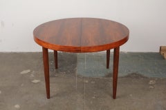 Rosewood round Danish mid century modern dining table