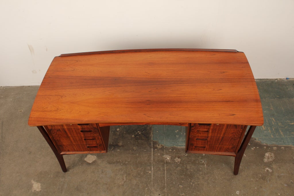 Mid-20th Century Danish modern executive rosewood desk by Svend Aage Madsen