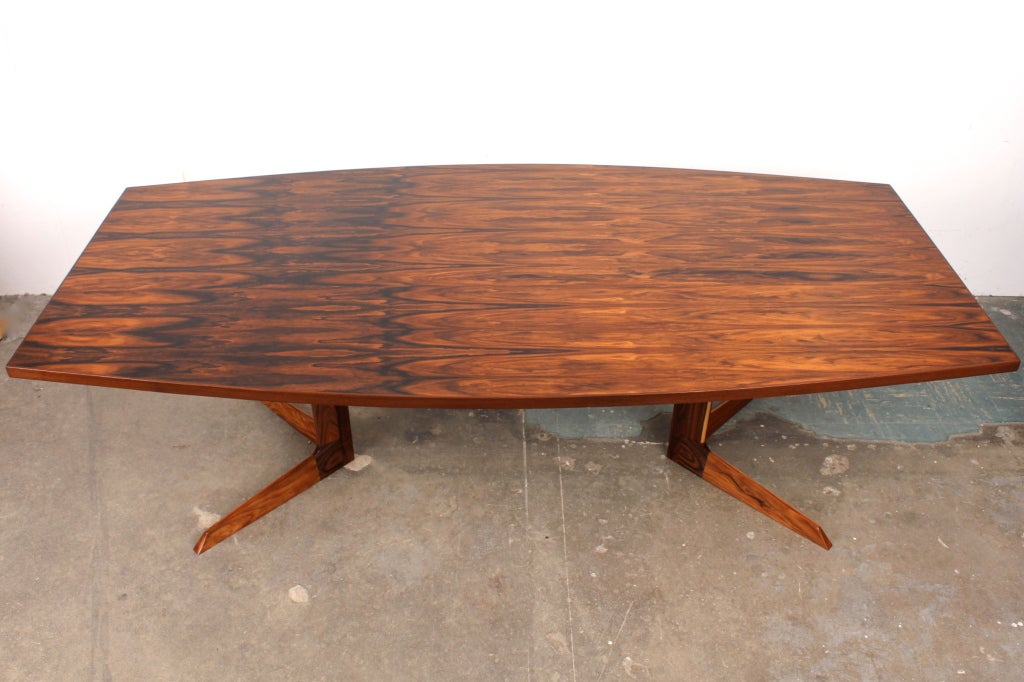 Newly produced rosewood dining table with rosewood legs.