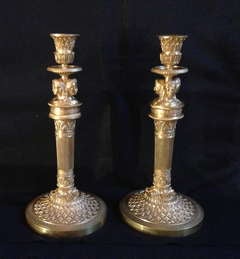 Exceptional pair Empire gilt bronze candlesticks to Claude Galle