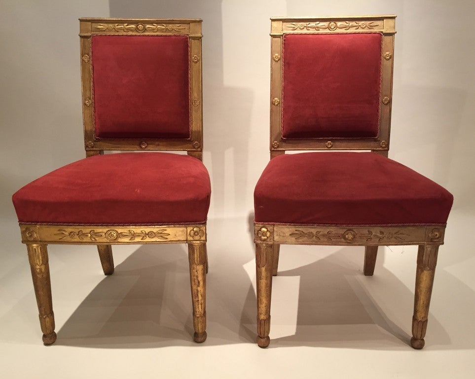 Pair of gilded wood chairs Empire by Marcion or Bellangé, Paris 1805
Pair of Empire chairs wooden flat files Beech gold leaf.
Front feet spindles sheets of water falls, sabers on the back foot, cross carved with flowers and closed lotus