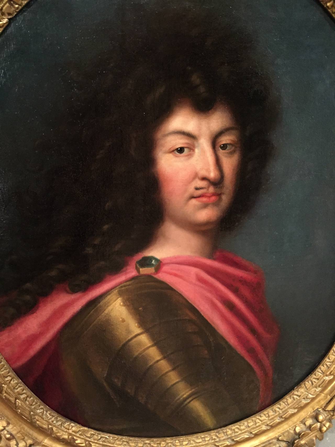 Louis XIV in Armor, Workshop of Pierre Mignard (1612-1695)
Louis XIV in Armor, Workshop of Pierre Mignard (1612-1695), French school circa 1670.

The portrait dates back to 1670, Louis XIV is represented in armor gold color symbolizing the solar