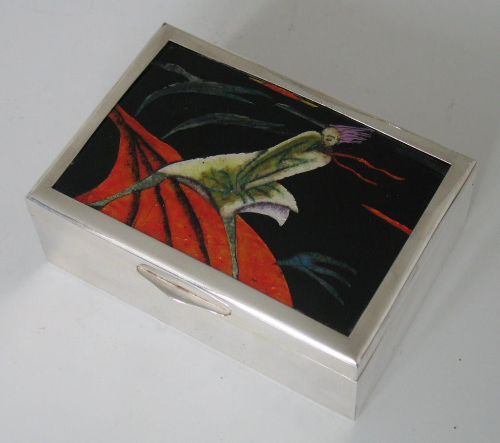 A Fine quality Wiener Werkstatte electroplated box with black stained cedar lining and an enamelled panel set into the hinged lid by Max Snischek.