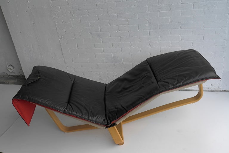 Westnofa lounge chair black leather and wood at 1stDibs
