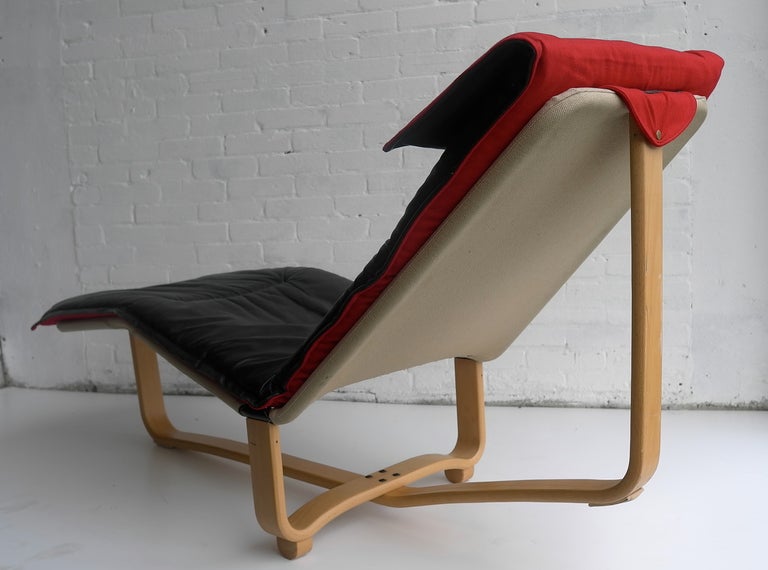 Westnofa lounge chair black leather and wood at 1stDibs