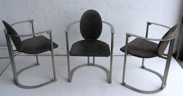 Set of six  style stainless steel 1970s deco dining chairs. Very well made heavy pieces with beautiful details. We kept the original fabric but they are in need of new upholstery. 

Each chair is: 80cm heightx54cm widthx45cm deep