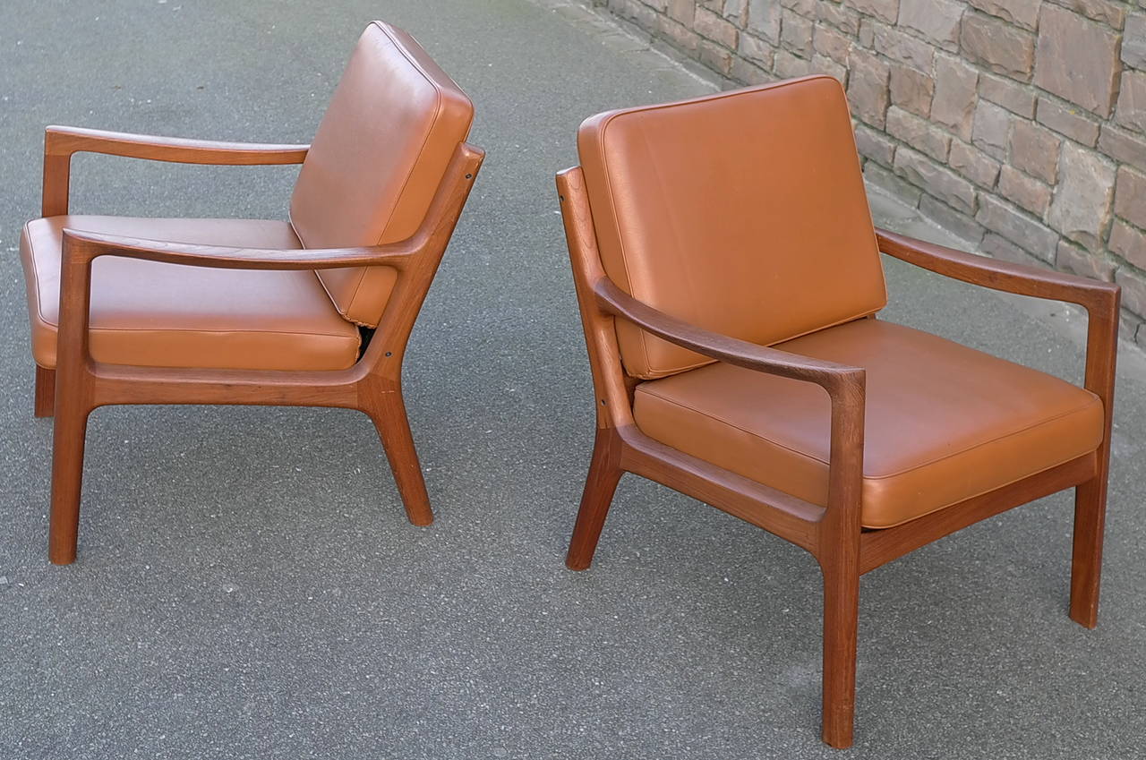 Ole Wanscher Senator easy chairs by France & Son in Denmark 

Teakwood with vinyl seats