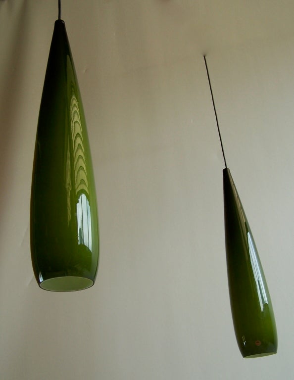 Pair of green glass ceiling lamps by Kastrup Holmegaard .


65 height, 12cm diameter each lamp