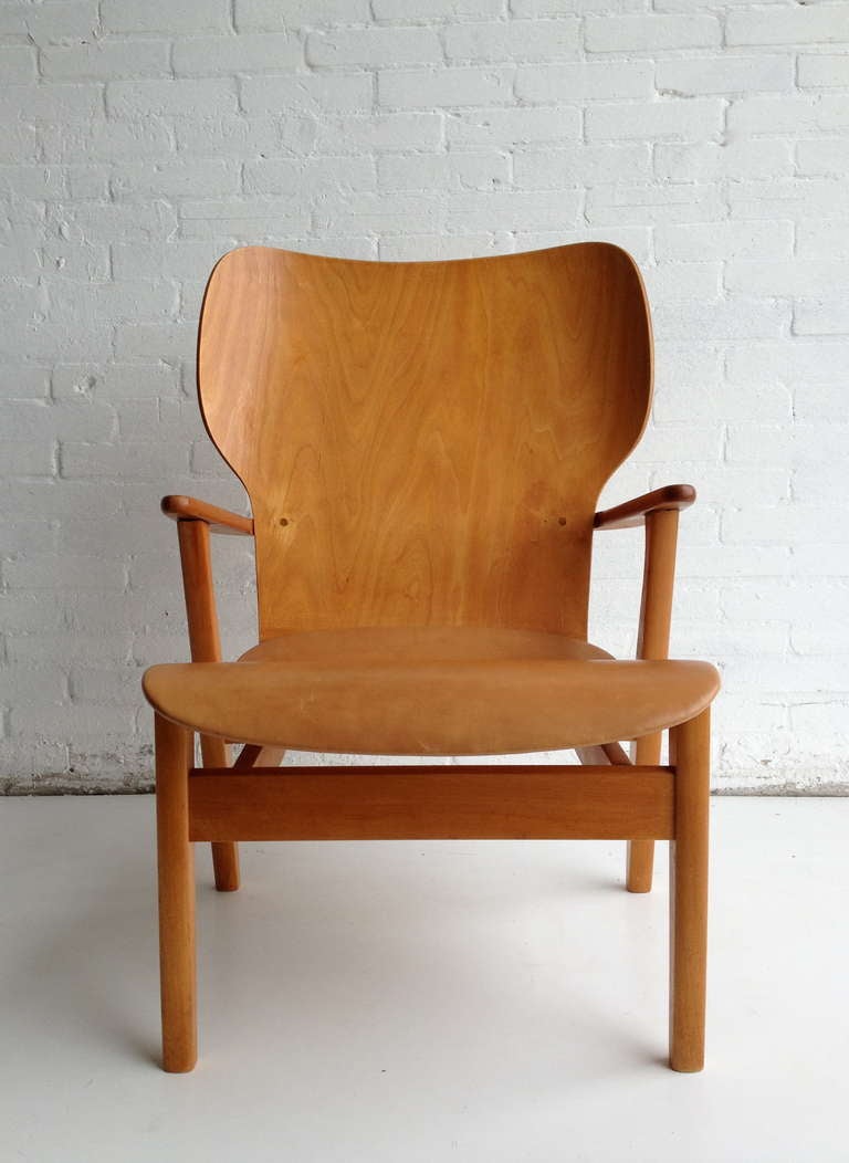 Finnish Ilmari Tapiovaara Domus leather and plywood armchair 1948