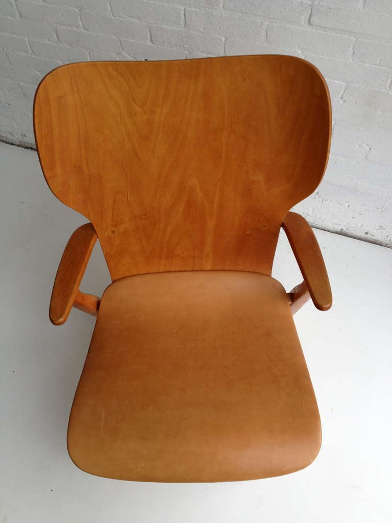 Mid-20th Century Ilmari Tapiovaara Domus leather and plywood armchair 1948