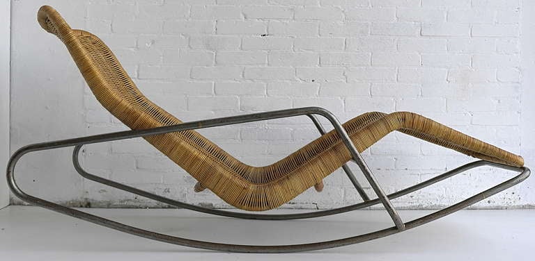 Rare Dirk Van Sliedrecht rattan rocking chair. Only a view of these where made by the designer for Brothers Jonkers rattan factory The Netherlands.