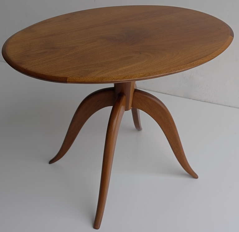 Elegant wooden oval Italian side table 1960s

Height 64cm, 75cm x55cm