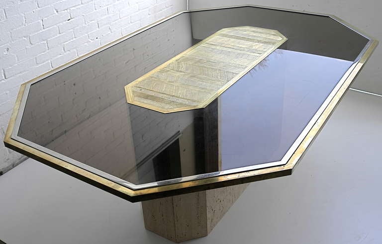 Rare Roger Van Hevel glass and etched brass art table on a travertine base. Signed by the artist in the brass plate, see image number 3 for detail