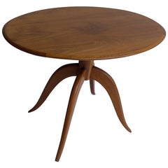 Elegante mesa auxiliar italiana ovalada de madera años 60