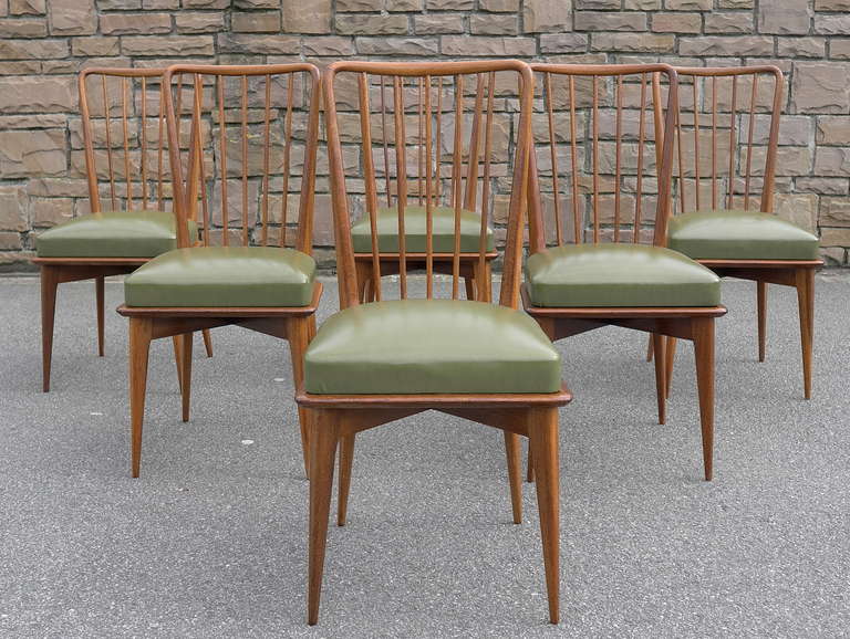 Set of six Paolo Buffa wooden dining chairs with the original green seats.