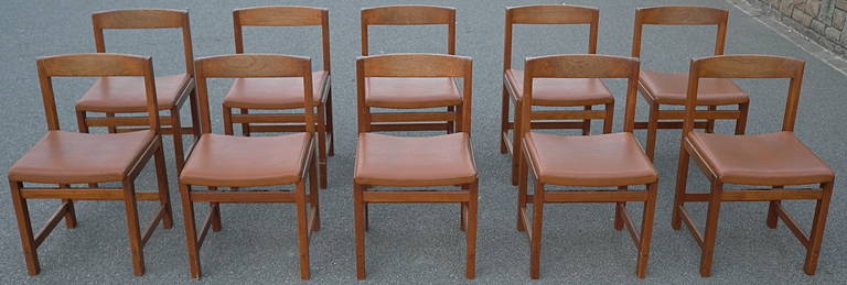 Ten Swedish dark teak dining chairs.

Very well crafted curves and wood joints.