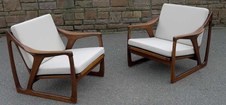 Pair of lounge chairs by De Ster, The Netherlands, 1960s.

The cushions are reupholstered with off-white wool.

 