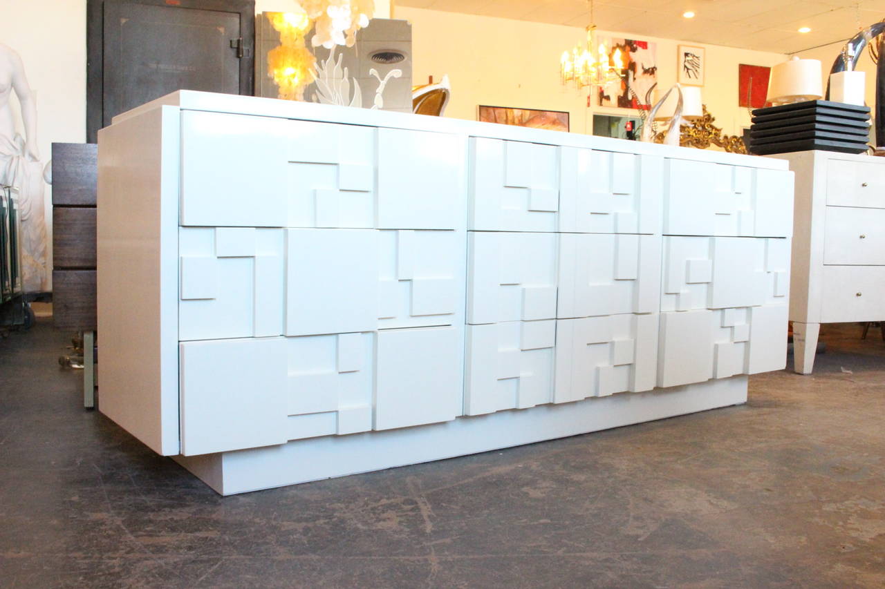 Newly lacquered in white is this stunning brutalist dresser by Lane.

dimensions: 78