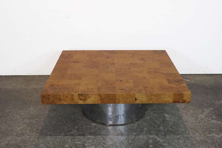Milo Baughman coffee table, by Thayer Coggin, square top of patchwork burl wood over a round chromed metal base, original finish, 40