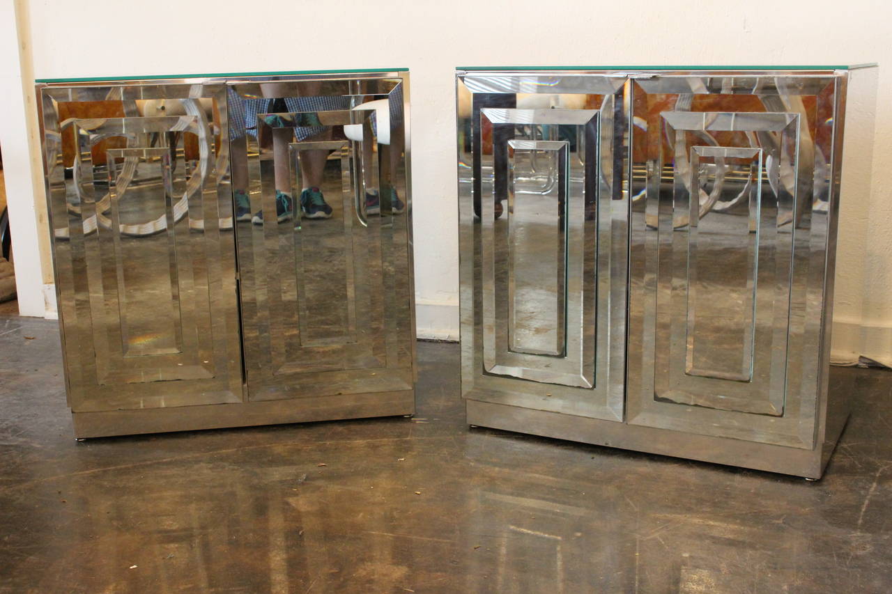 Pair of Ello mirrored nightstands with stacked mirror front panels. 

Dimensions: 24.75