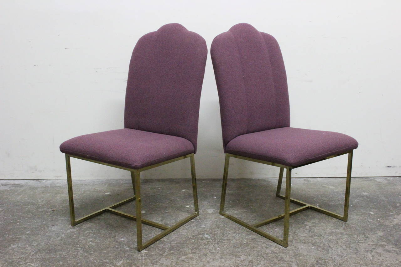 Set of six camelback and brass dining chairs in purple upholstery. Upholstery is in good condition and can be used as is, circa 1980s.

Dimensions: 19