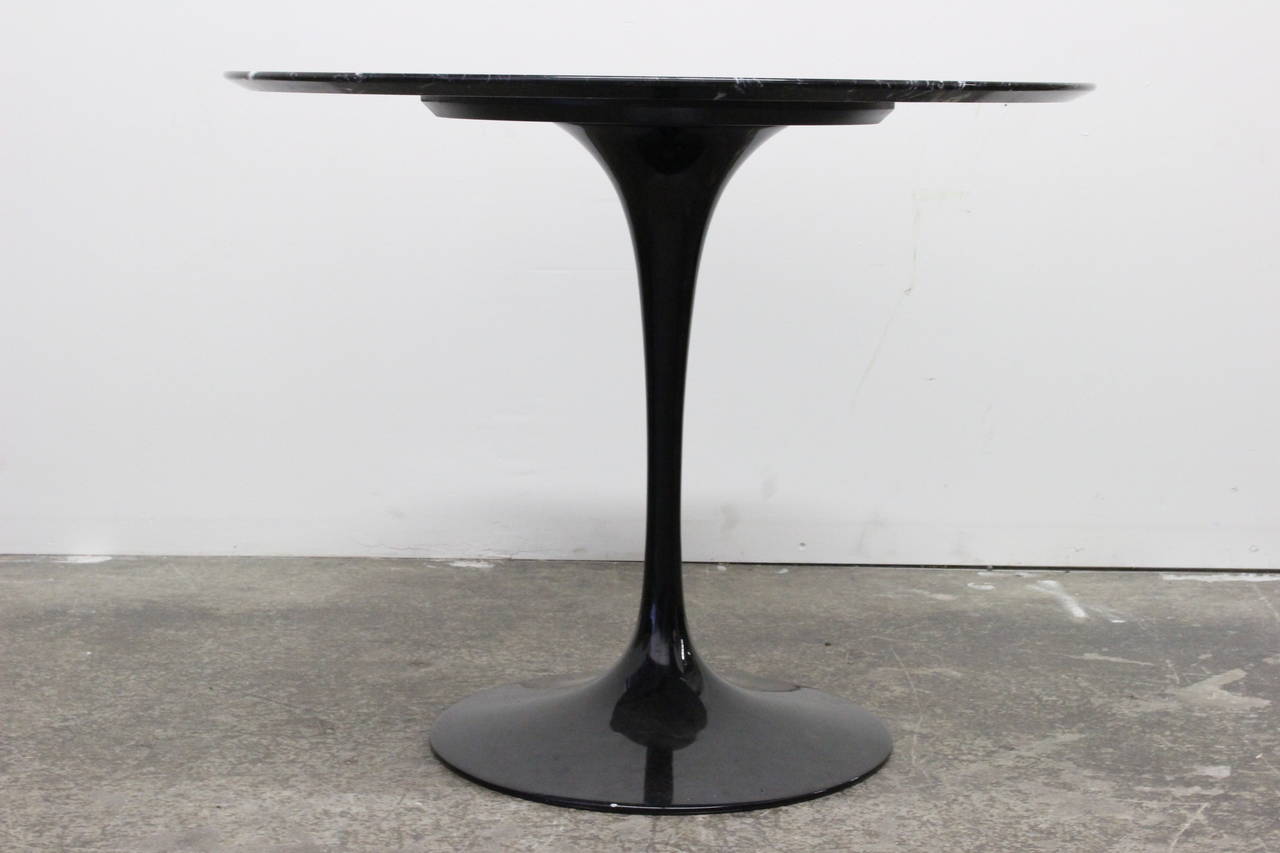 black marble saarinen table