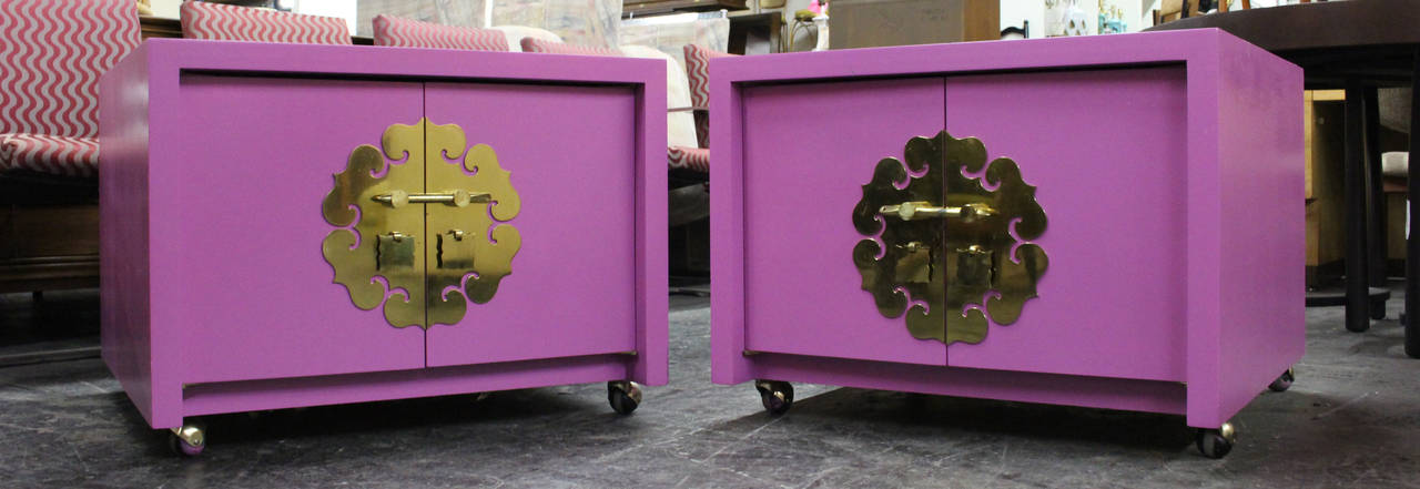 Pair of radiant orchid Asian Style cabinets with orange suede interiors.

Dimensions: 30