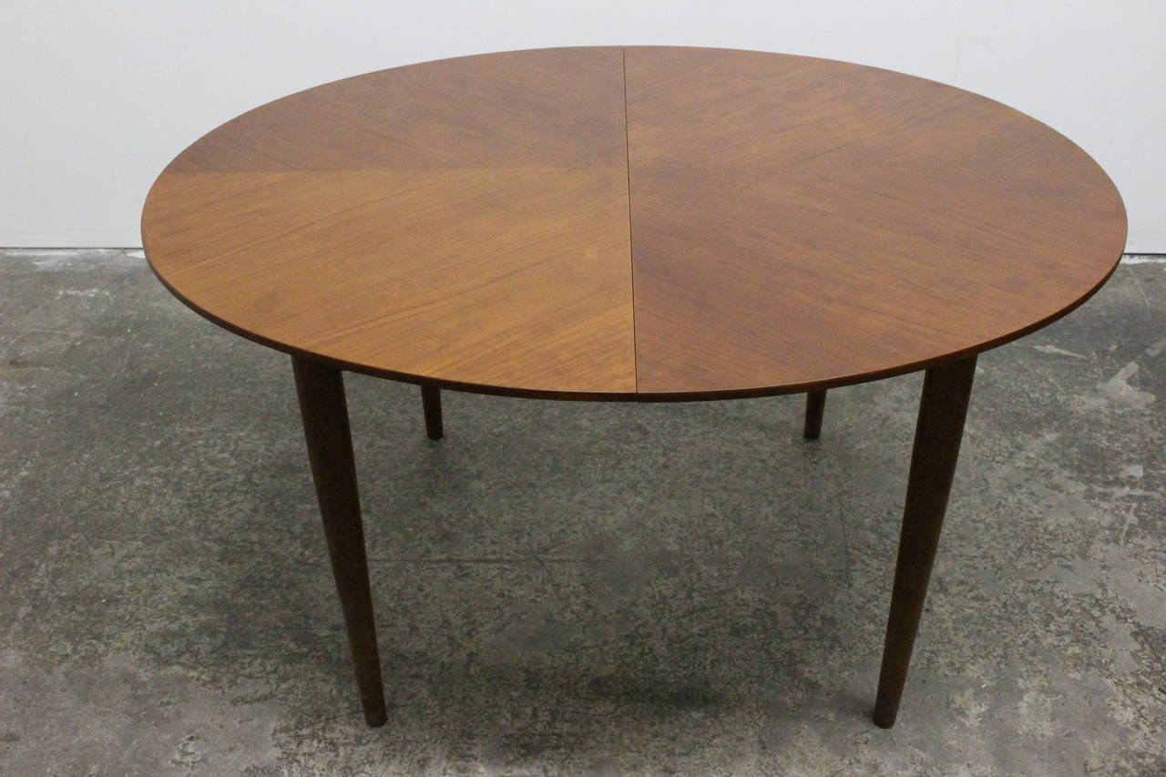 Dining table by Finn Juhl for Baker. The table has three leaves @ 14