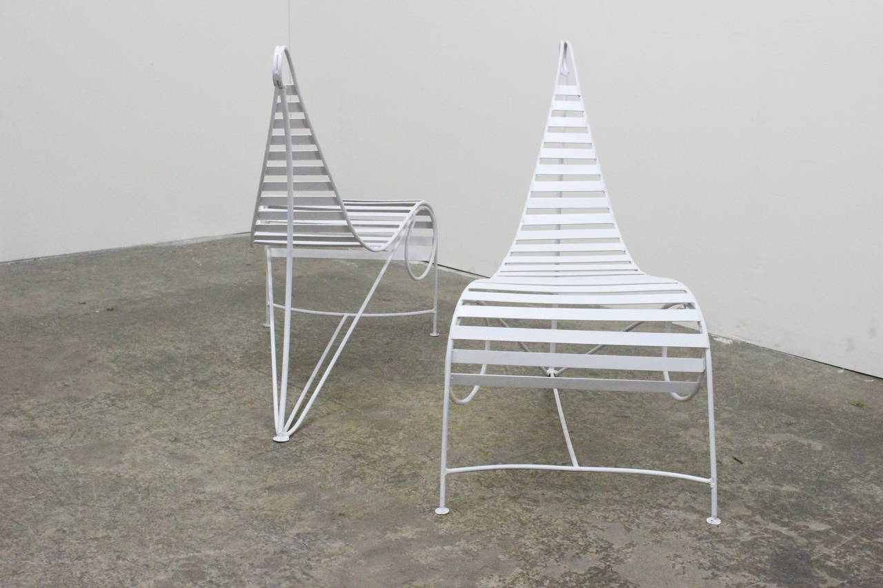 Pair of bent steel lounge chairs in the style of André Dureuil. 

dimensions: 19