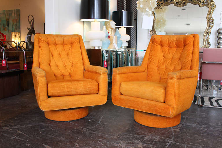 These modern chairs are exceptionally comfortable swivel rockers with plinth bases. Made by Fisher Westdale Furniture Co., USA