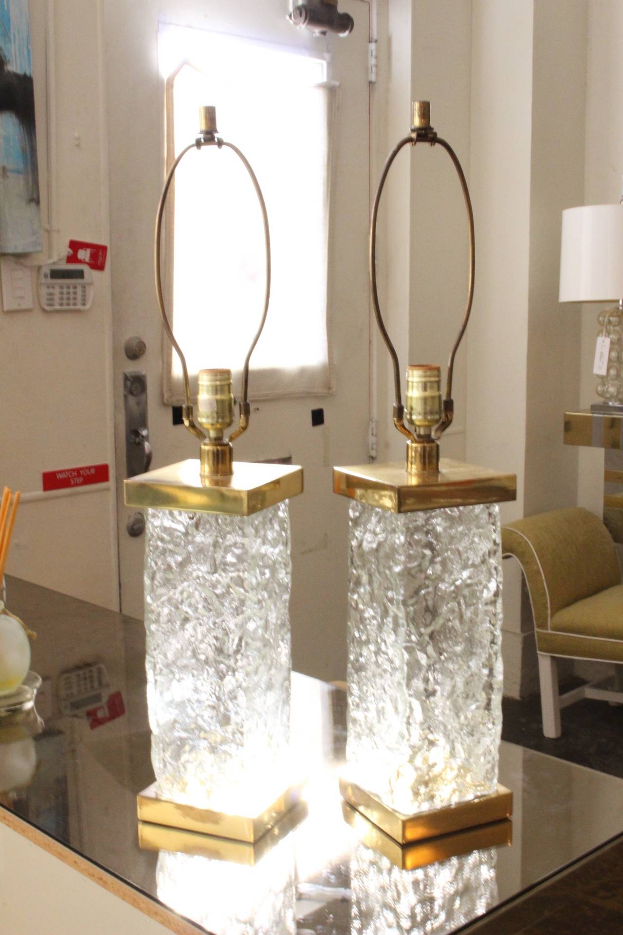 Pair of textured glass and brass lamps by Paul Hanson. Lamps have original wiring, circa 1960s

Dimensions: 5