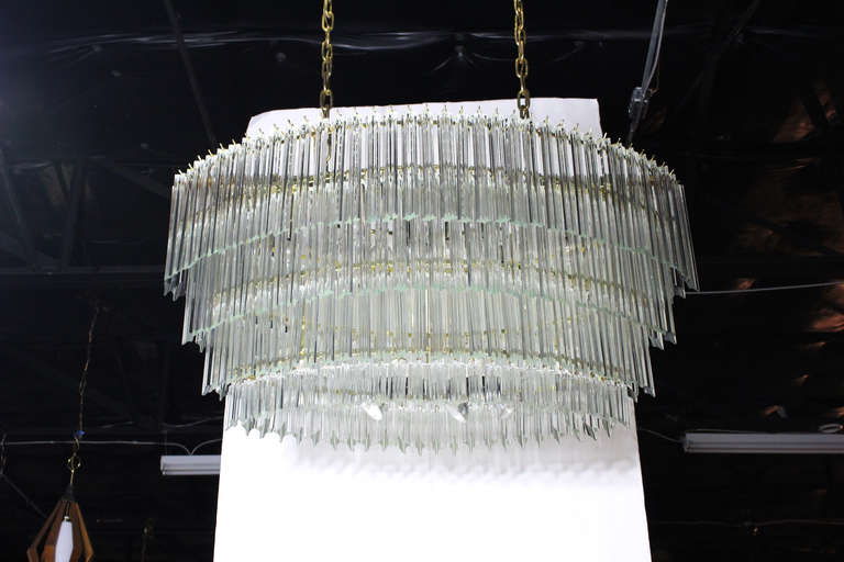 Monumental and beautiful four-tier Venini crystal chandelier.