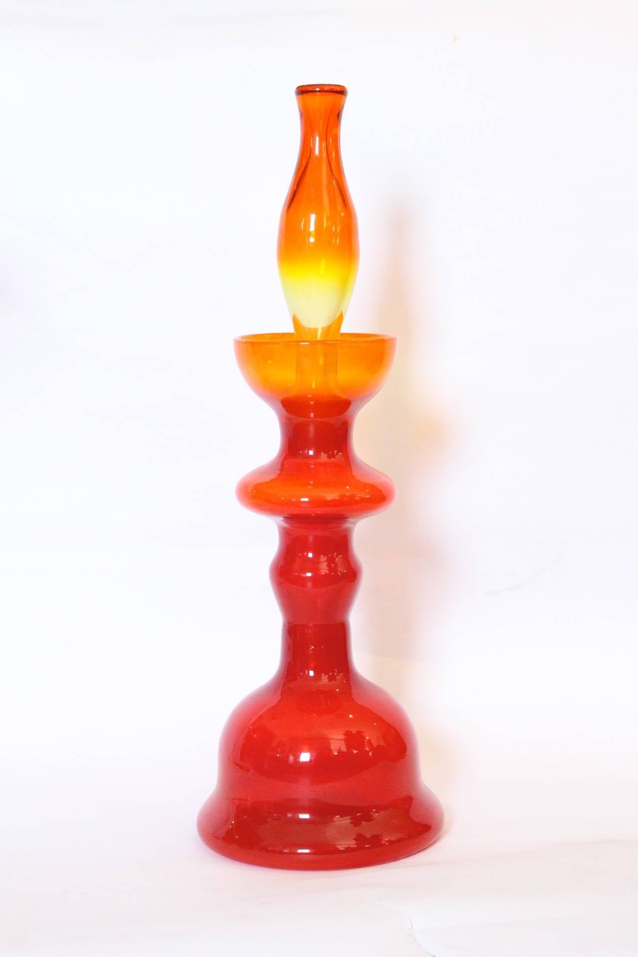 Red-orange glass decanter by Wayne Husted for Blenko. Signed, circa 1960s.

Dimensions: 7