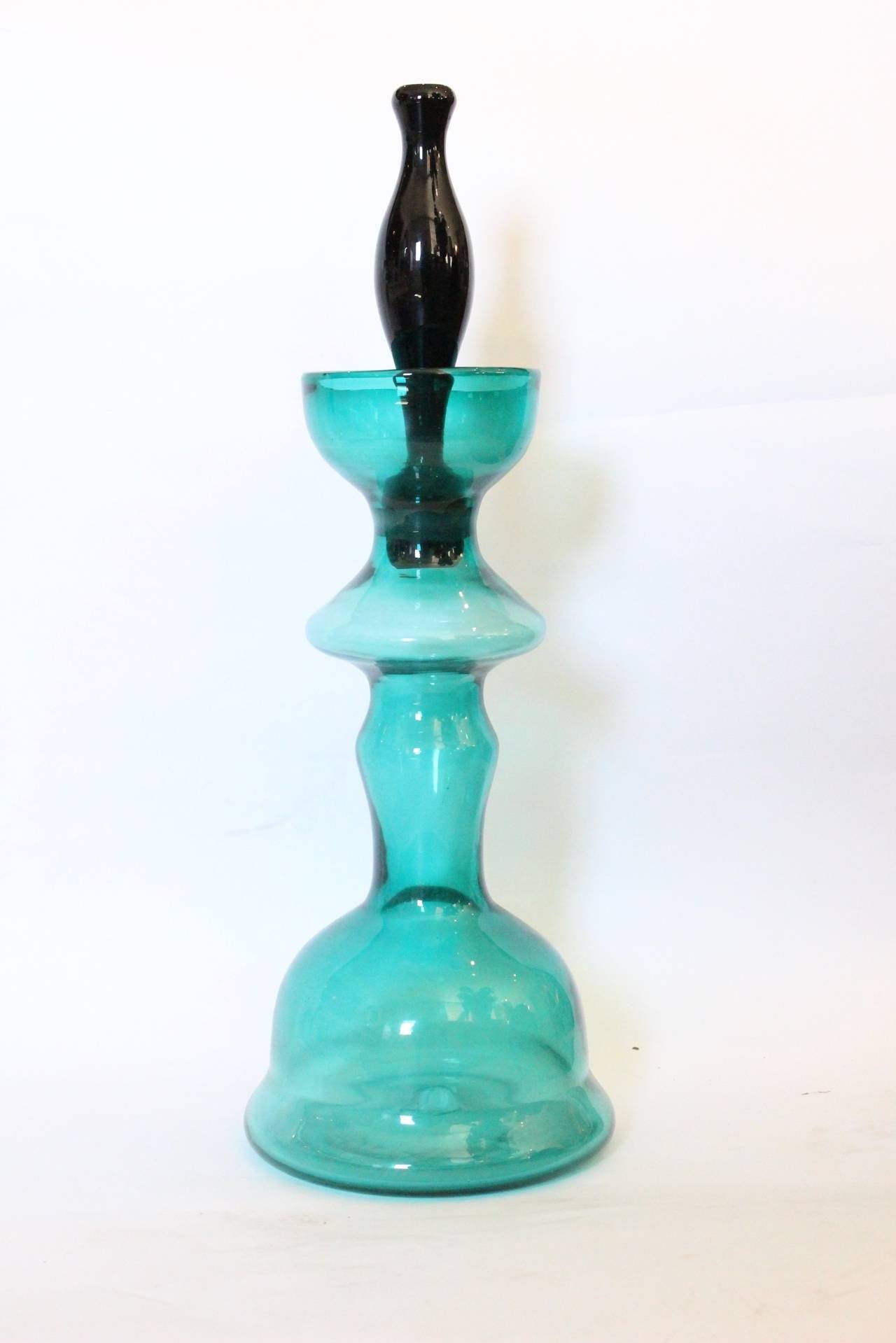 Teal glass decanter by Wayne Husted for Blenko. Signed, circa 1960s.

Dimensions: 7