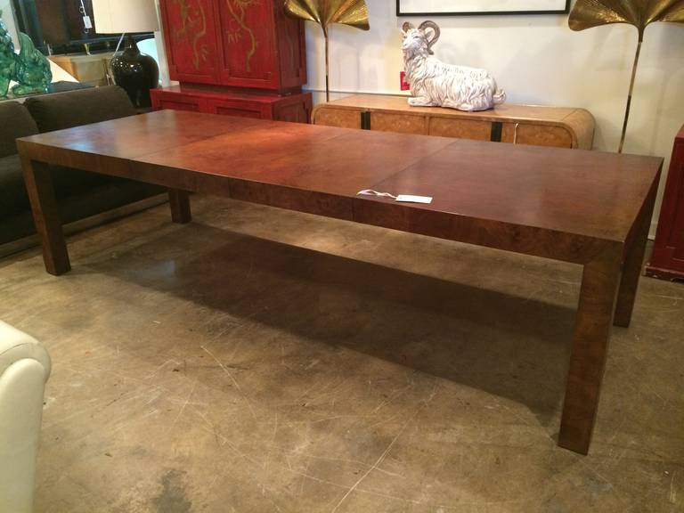 Burl wood parsons table by Milo Baughman. Seats 10 people comfortably. Has two 22