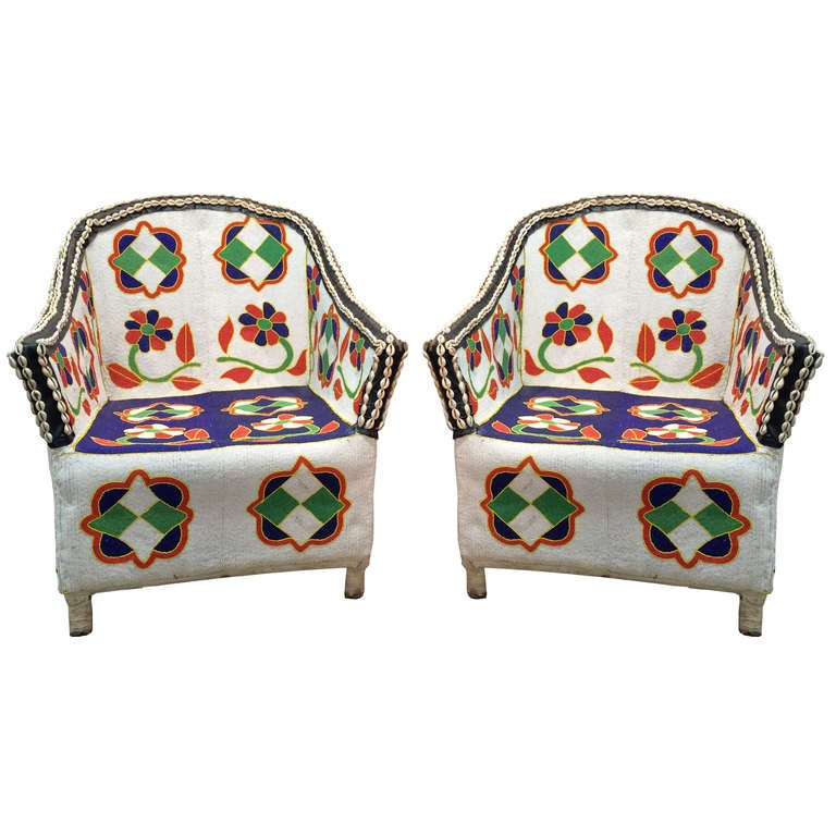 Add a piece of drama to your room, with this hand beaded chair. The beadwork is both front and back, and was hand made by the Yoruba tribe in Nigeria. $2900 each.