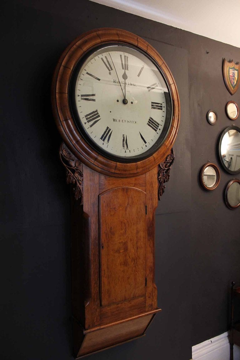 The impressive nature of this clock has been difficult to capture with the photograph.  It is nearly two meters tall and made from golden oak.  The clock dates from 1860 made by William Manning 20 Cross St Worcester.  The clock has a weight driven