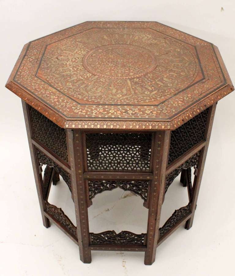 A late 19th century North Indian brass copper and ebony inlaid Shisham octagonal table in very good order.