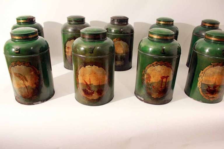 A rare set of mid 19Th century parrot green tea canisters  all numbered one-ten with individual pictorial scenes painted on the front in original condition. 
