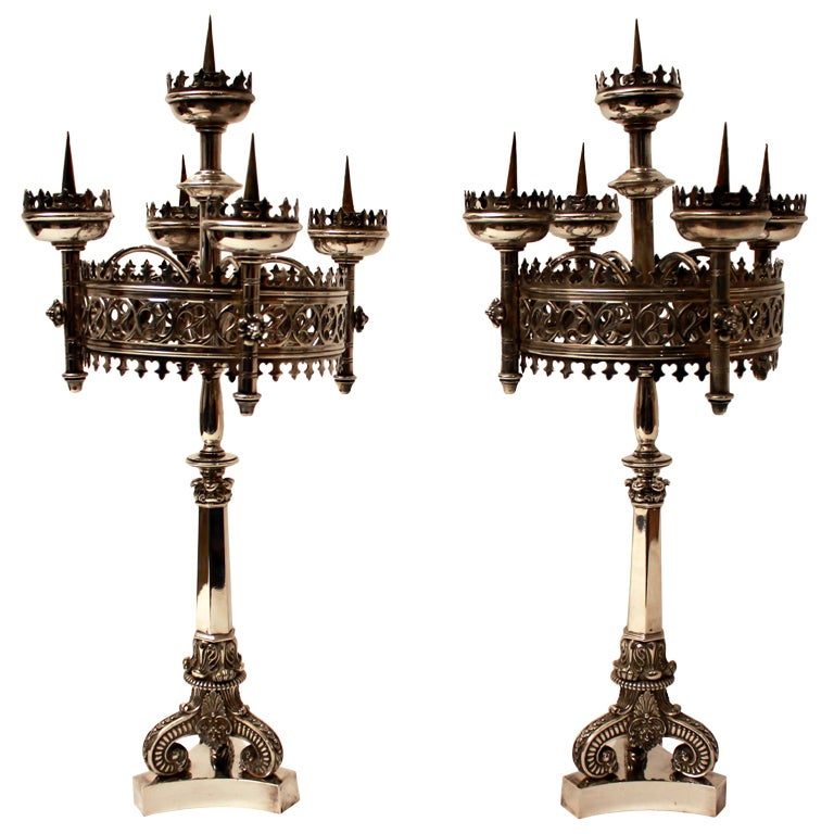 A fantastic pair of 19th century silver plated gothic revival candle sticks...