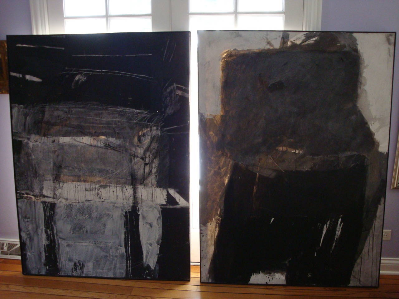 This is a pair of abstract oils done by Eric Erickson in oil and graphite in 1987
