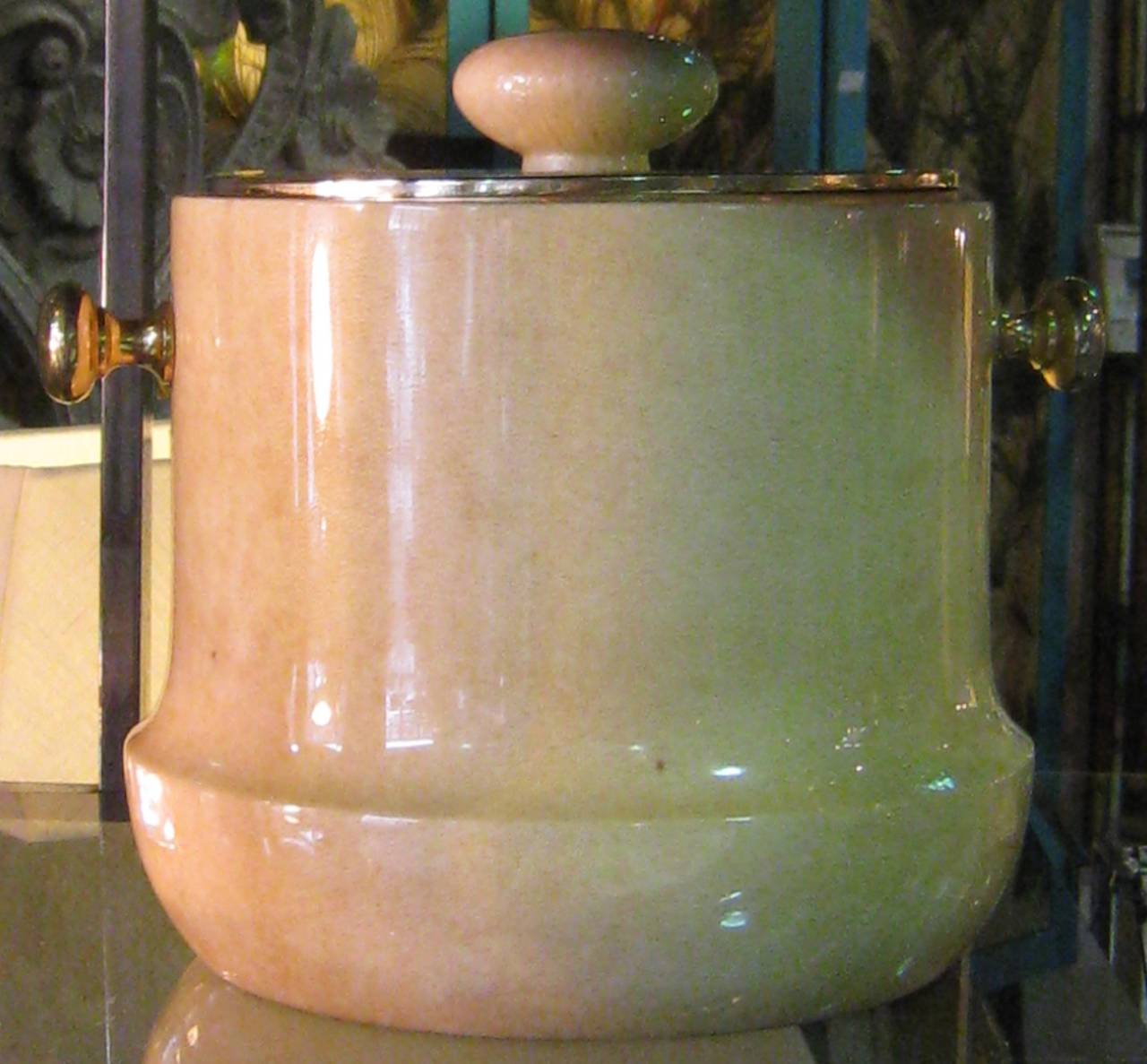 Aldo Turo lacquered goatskin ice bucket in butter color having gilt brass lid and handles. Original label on underside.
