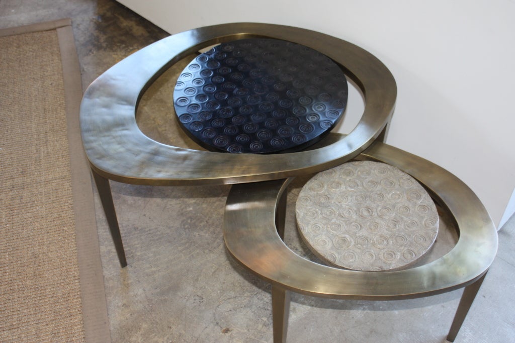 A great set of bronze and shagreen nesting coffee tables
larger table 28W x 20.5D x 15.76 H
smaller table  16W x 20.5D x 13.75H