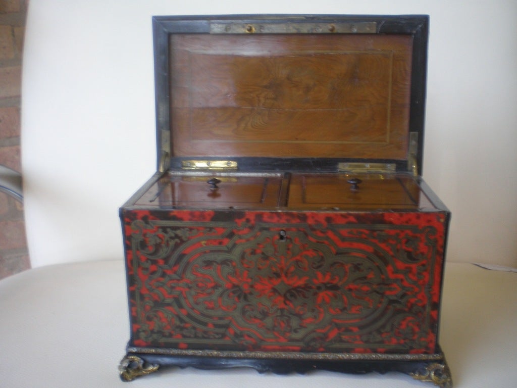 Double mahogany tea caddy with brass and ebony inlay.