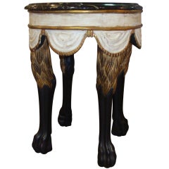 Lion leg table by Dennis and Leen